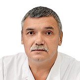 Врач Тезиков Александр Сергеевич