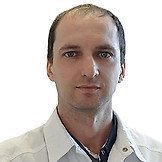 Врач Трошков Олег Васильевич